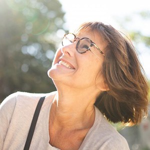 Lady smiles at the sun