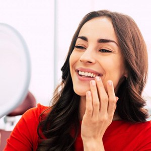 Palm Coast patient smiling with new dental implants