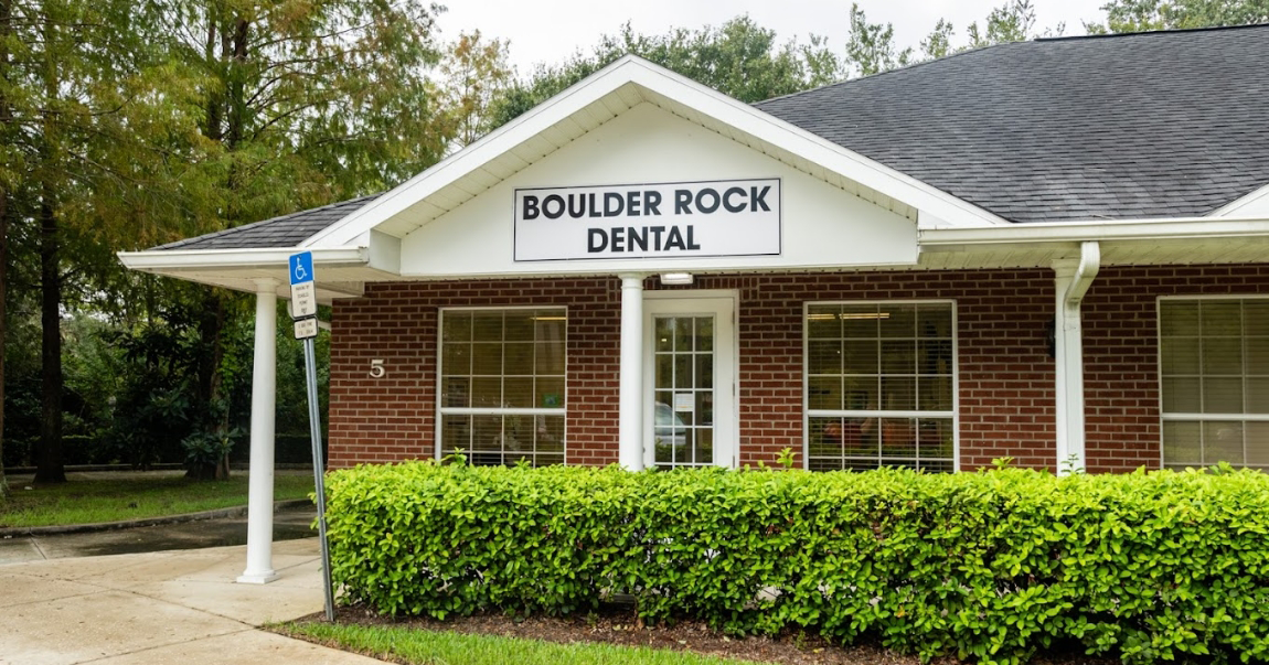 Boulder Rock Dental building with bushes in front